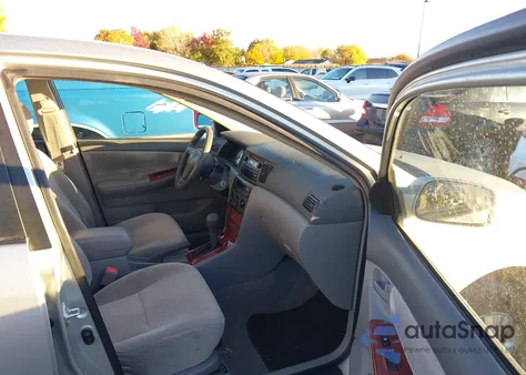 2004 Toyota Corolla Le z USA, uszkodzony, nr VIN JTDBR32E142021359